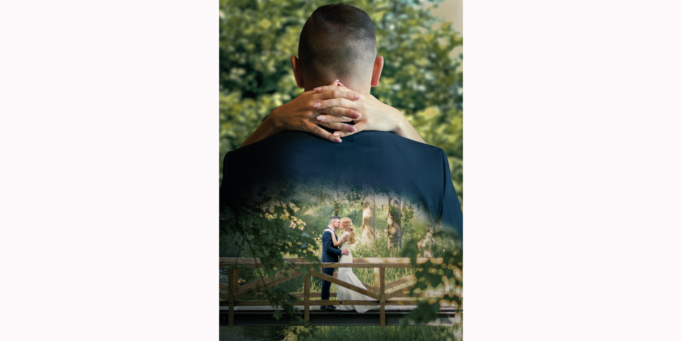 Paarshooting Hochzeit Kerpen Ein Hochzeitspaar umarmt sich vor einer malerischen Kulisse im Freien.